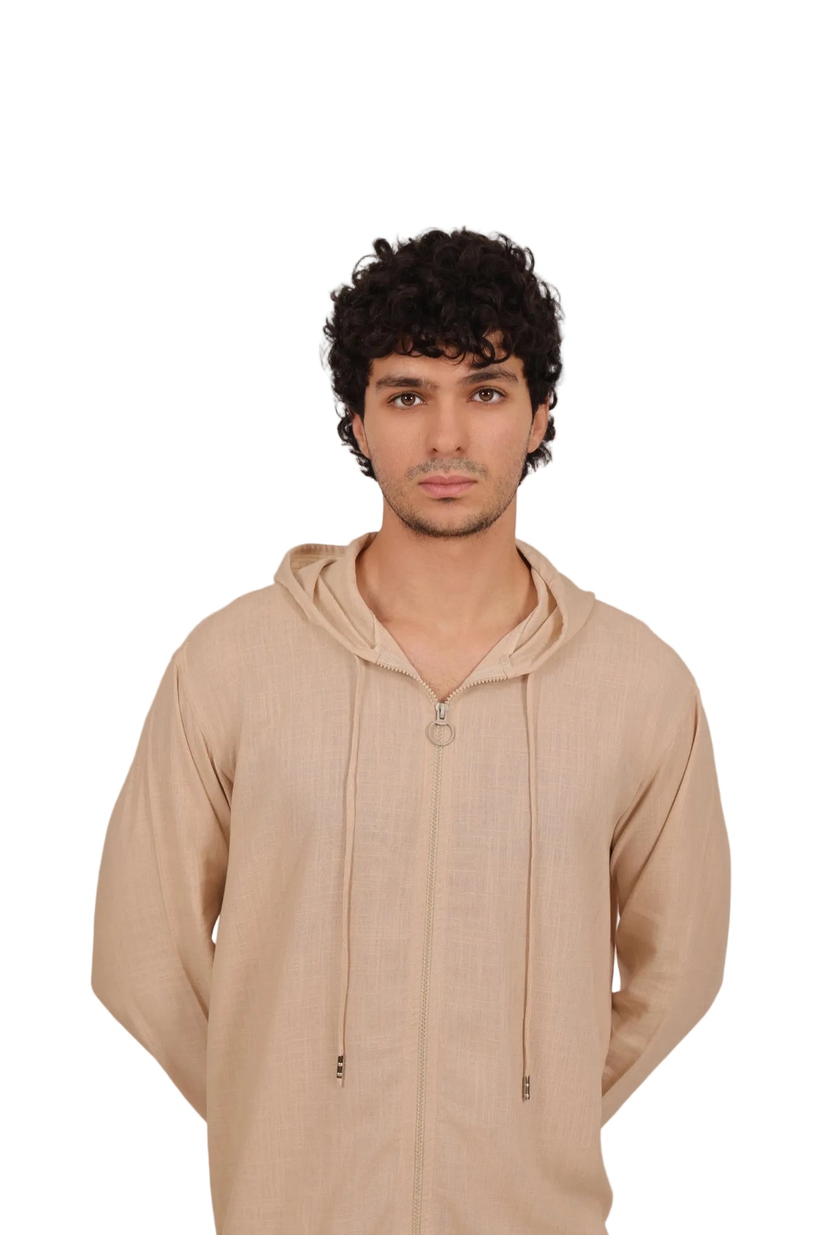 Man wearing a beige hoodie against a plain background