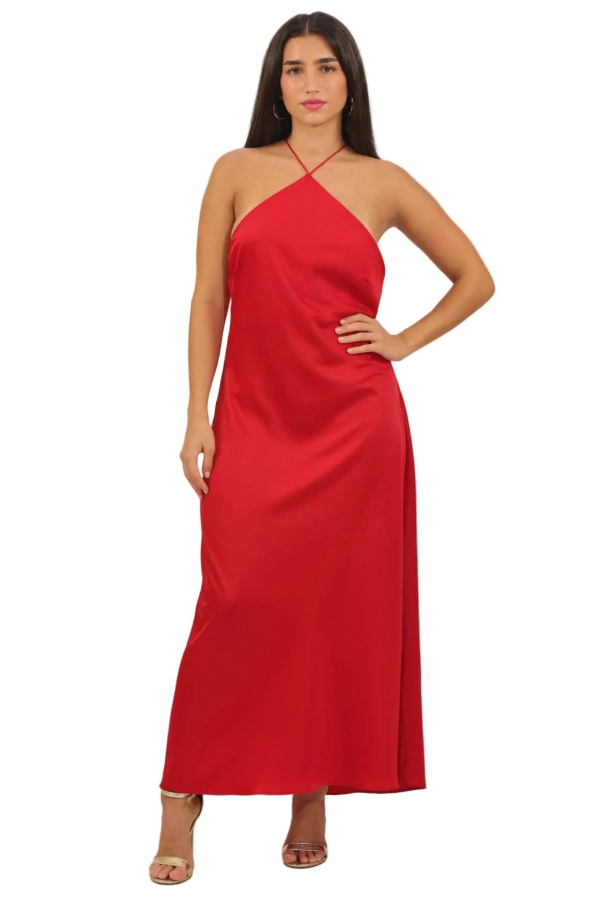 Woman wearing a red one-shoulder dress on a beige background