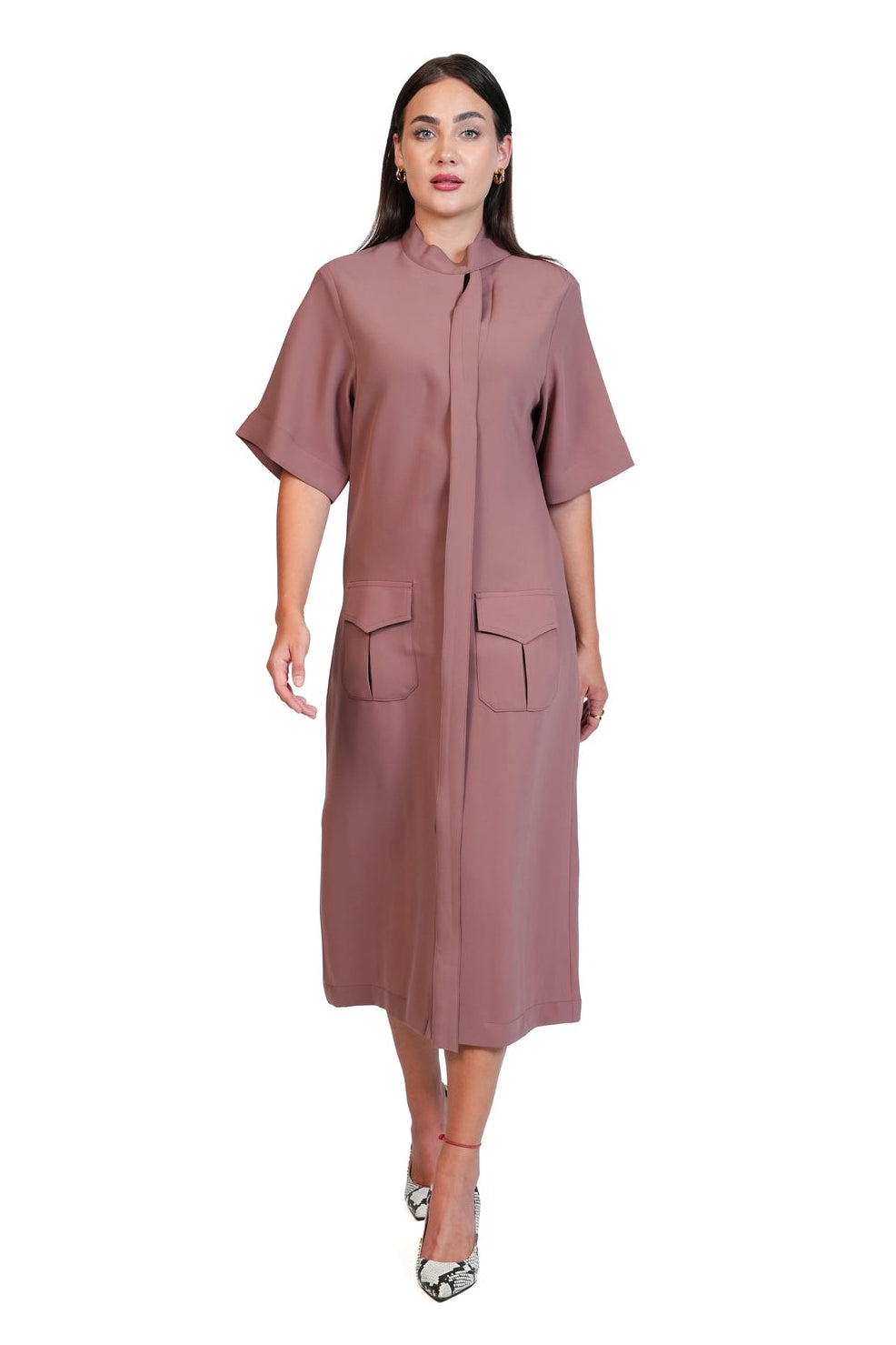A woman modeling a dusty rose midi shirt dress with short sleeves, a pointed collar, and front patch pockets, set against a plain white background.