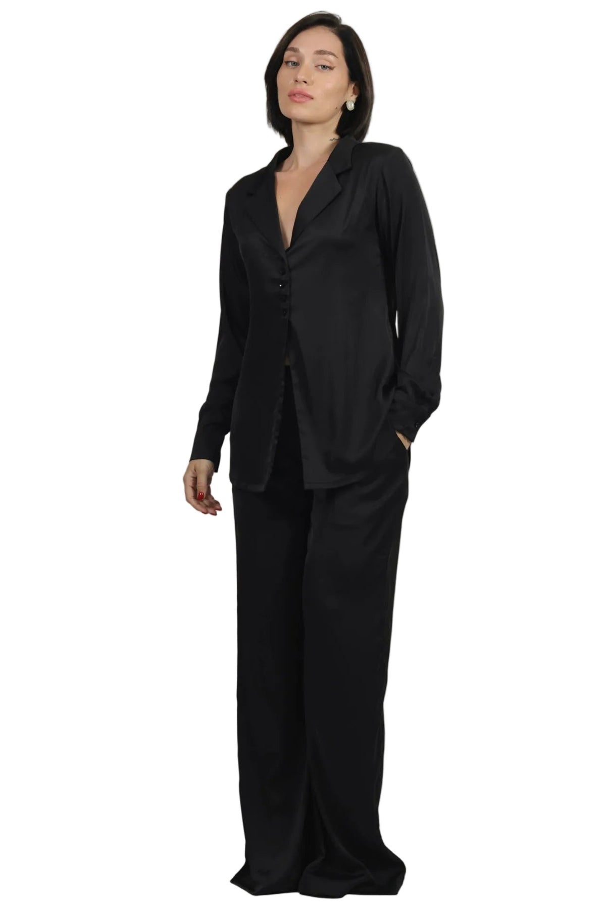 Woman wearing a black set on a white background